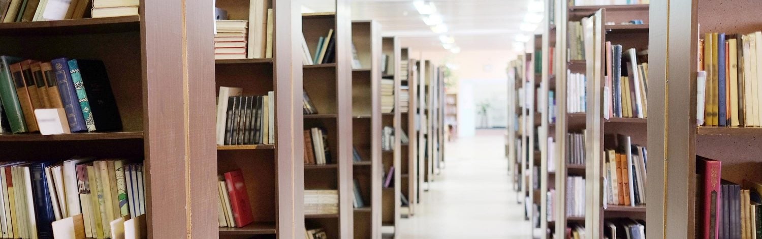 library setting with books and reading material